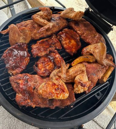 Assorted meats on the small smoker